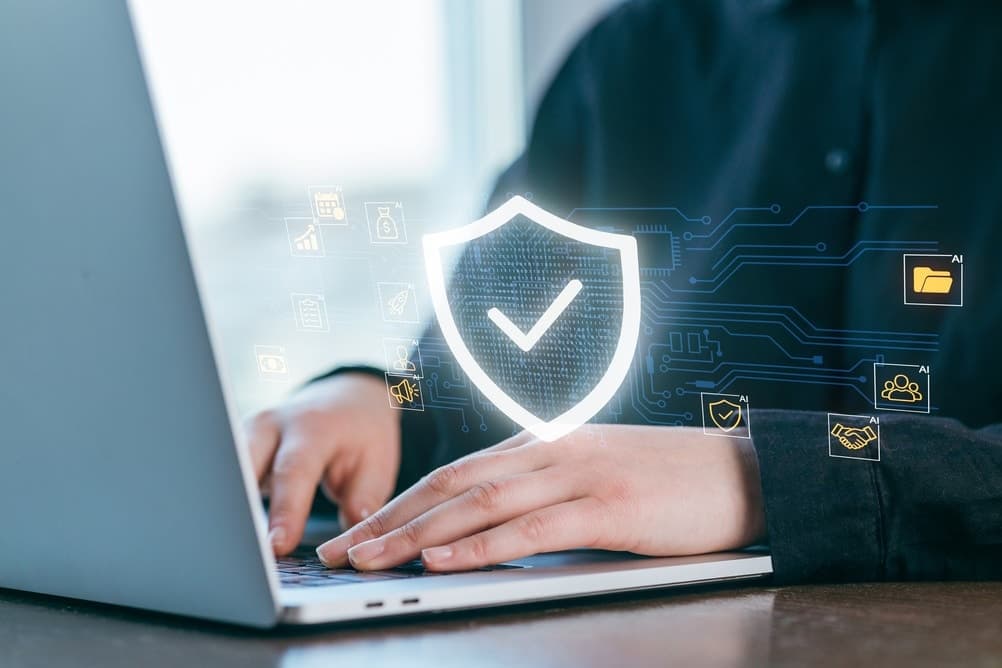 A,Person,Works,On,A,Laptop,In,A,Bright,Office,