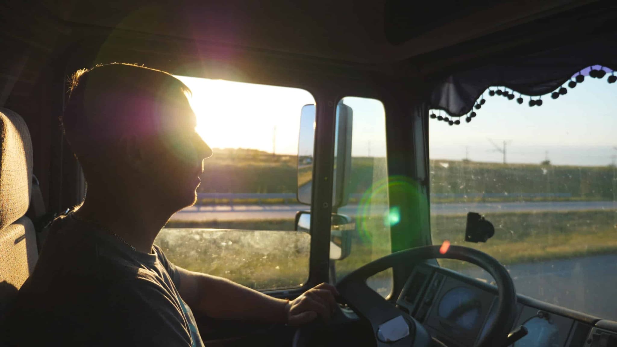 Man,Driving,A,Truck,And,Carefully,Watching,The,Road.,Caucasian